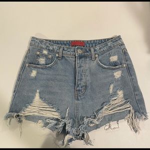 Signature8 ripped high rise denim shorts